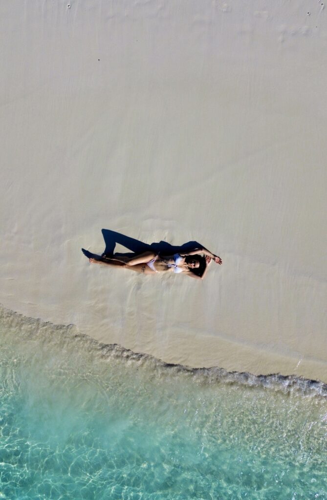 revenge travel in maldives beach drone shot